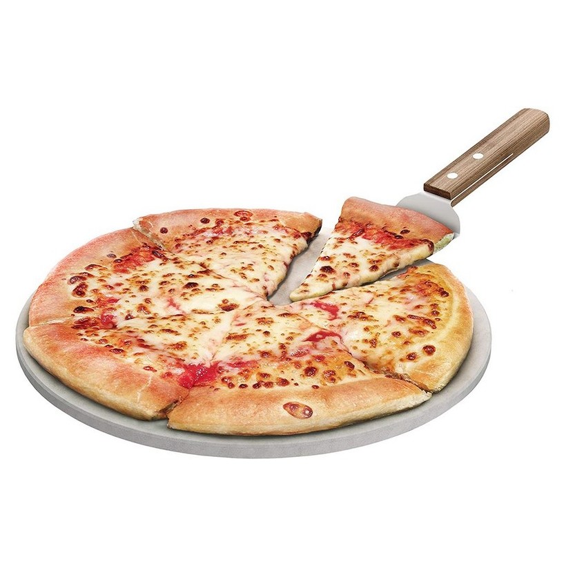 photo pietra per pizza e spatola per grill