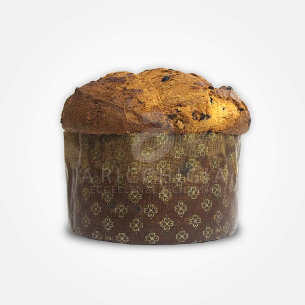 Homemade Panettone with Chocolate and Grains Pistachios with Glass of Pistachios Cream